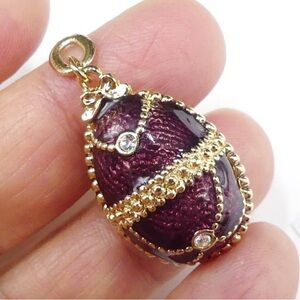 Vintage gold tone chain enamel rhinestone egg pendant color burgundy